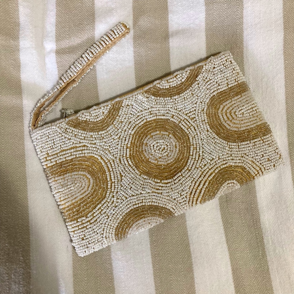 Handmade white and cream beaded wristlet.